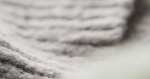 Micro video of close up of grey wooly fabric with copy space Stock Footage 331246497
