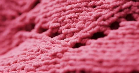 Micro video of close up of pink wooly crochet fabric with copy space Stock Footage 331295273