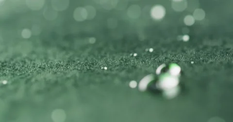 Micro video of close up of water drops with copy space on green background Stock Footage 331208778