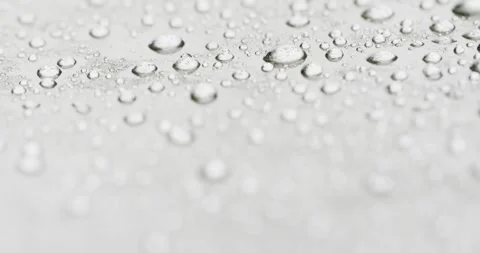 Micro video of close up of water drops with copy space on grey background Stock Footage 331295264
