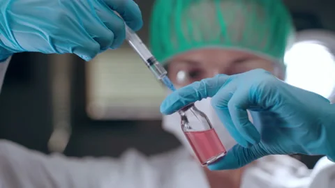 Microbiological experiments in researching laboratory, concentrated female Stock-Footage 158821684