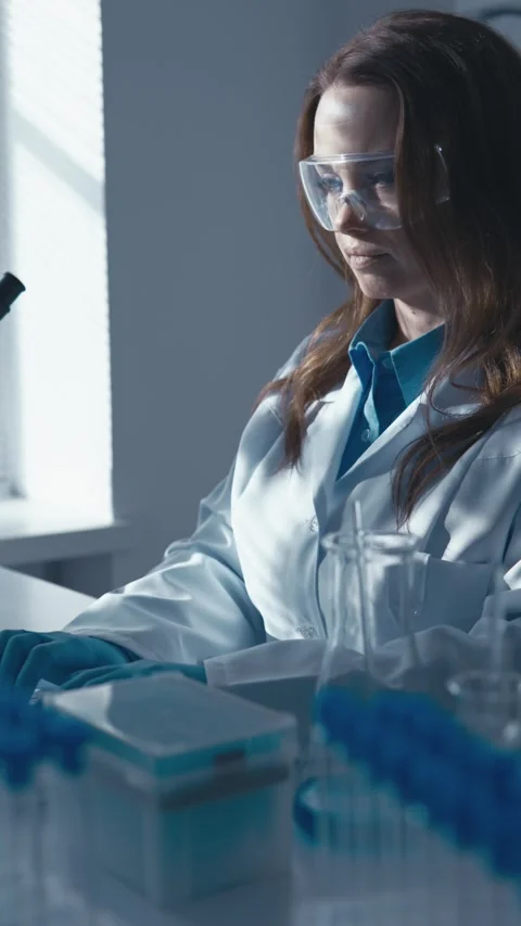 A microbiologist, a computer microbiologist, explores the mechanisms of Video stock 270221980