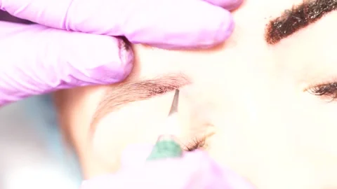 Microblading Eyebrow Tattoo, Permanent Makeup, Using Special Needle, Injects Stock Footage 135555095
