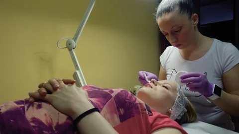 Microblading eyebrows procedure Video stock 89662502