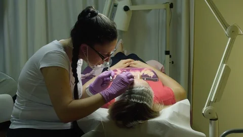 Microblading eyebrows procedure Stock Footage 89663814