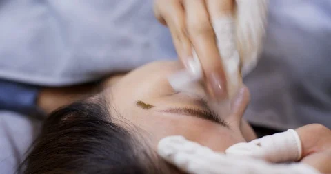 Microblading procedure, master work on woman eyebrow Stock Footage 116650482