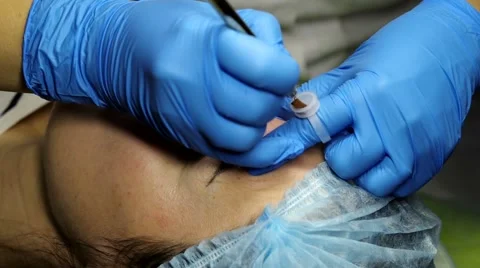 Microblading procedure. Master works with the eyebrows Stock Footage 60122944