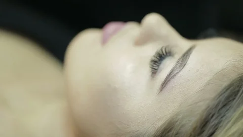 Microblading procedure. Master works with the eyebrows. Stock Footage 87404332