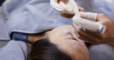 Microblading procedure,  Master works with the eyebrows on woman Stock Footage 116712242