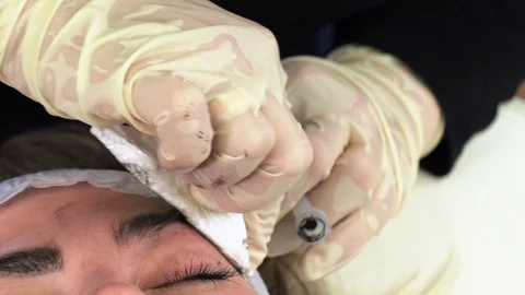 Microblading procedures in a beauty salon Stock Footage 113699477