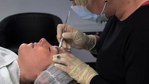 Microblading procedures in a beauty salon Stock Footage 113996695