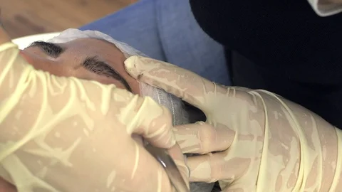 Microblading procedures in a beauty salon Stock Footage 113997573