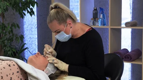 Microblading procedures in a beauty salon Stock Footage 114050988