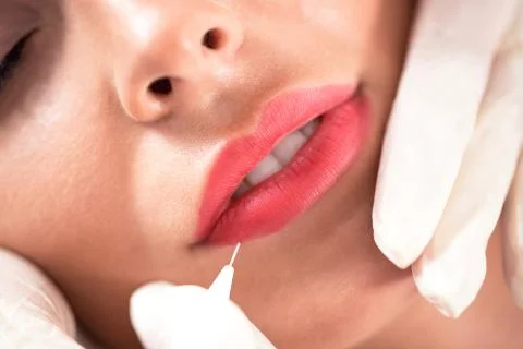 Microblading technique applied on kissable lips Stock-Fotos