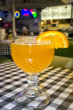 Microbrewed beer with orange slice Stock Photos