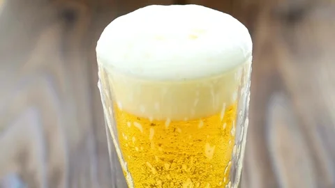 Microbrewery Close-up. Slow-motion Cold Light Craft Beer in a glass. Pub over Stock Footage 265768621