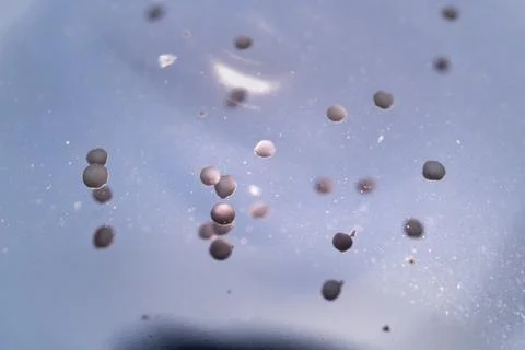 Microcapsules in cosmetics. Background Stock Photos