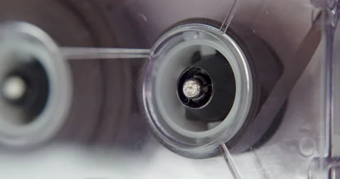 Microcassette Reel Playing In Shallow Focus Stock Footage 160259393