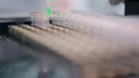 Microcentrifuge tubes in a bio lab experiment Stock Footage 1748557