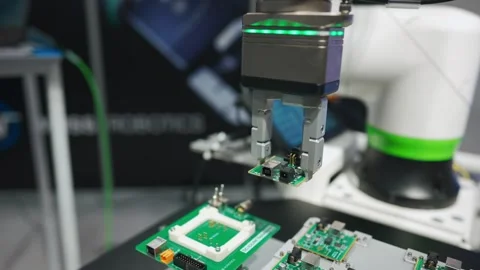 Microchip and microprocessor assembly with automated robotic arm factory Stock Footage 280117841