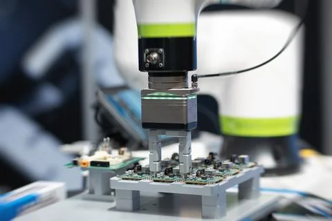 Microchip and microprocessor assembly with automated robotic arm factory 写真素材