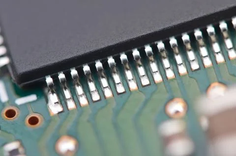 Microchip close-up on electronic board. Macro Foto stock
