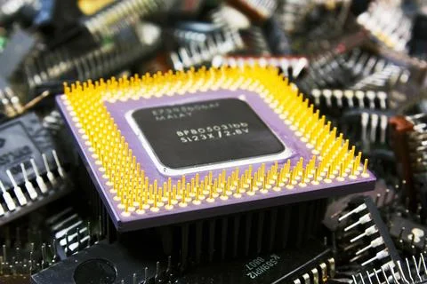 Microchip CPU Processor with Gold Pins on Circuit Board Stock Photos