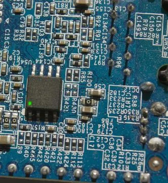 Microchip with electronic components on pcb Stock Photos