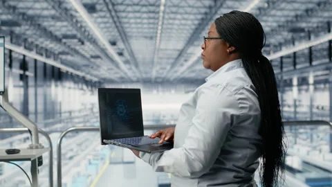 Microchip factory employees using AI deep learning tech to develop electronics Stock Footage 333386548