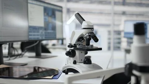 Microchip factory research office with workstations used to inspect processor Stock Photos