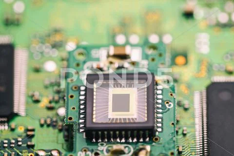Microchip on green board Stock Photos