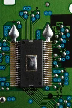 Microchip on green printed circuit board 스톡 사진