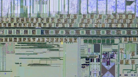 Microchip integrated circuit architecture under microscope Stock Footage 322896261