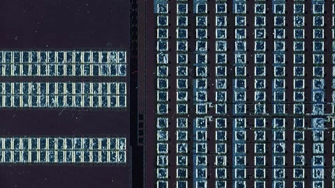 Microchip integrated circuit architecture under microscope Stock Footage 322896334