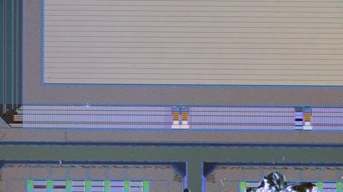 Microchip integrated circuit architecture under microscope Video stock 322896618