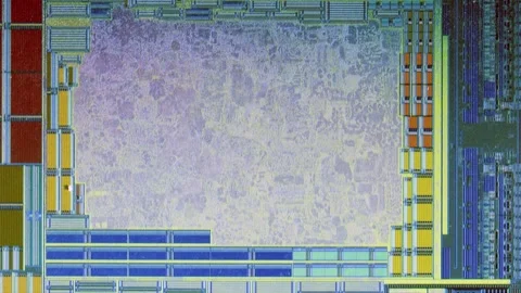 Microchip integrated circuit architecture under microscope Stock Footage 322896793