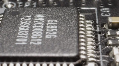 Microchip macro slider inside of a computer Video stock 125569971