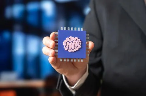 A microchip with neural network technology in the hands of a businessman. I.. Stock Photos