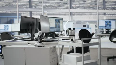 Microchip production engineering office with monitors Stock Photos