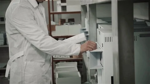 Microchip production factory, engineer checking process. Assembling the board Stock Footage 73881135