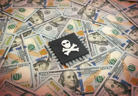 Microchip with a skull on a background of dollar bills. The sharp rise in t.. Stock Photos