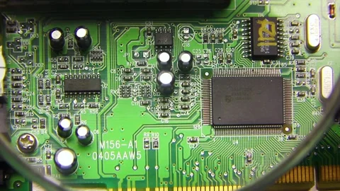 Microchippanel, the board is viewed under a magnifying glass Stock Footage 230488358