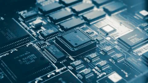Microchips on a circuit board. Stock Photos