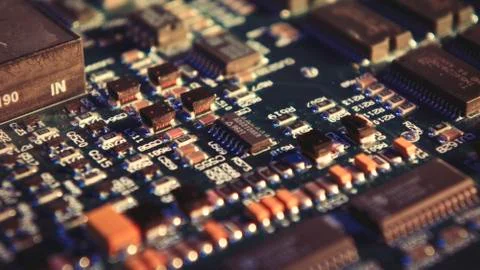 Microchips on a circuit board. Fotos Stock