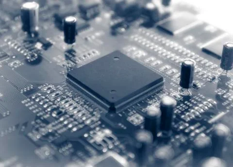 Microchips on a circuit board. Stock Photos