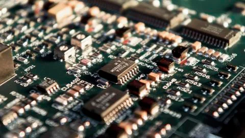 Microchips on a circuit board. Stock Photos
