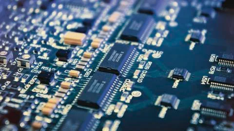 Microchips on a circuit board. Stock Photos
