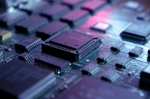 Microchips on a circuit board. Fotos Stock
