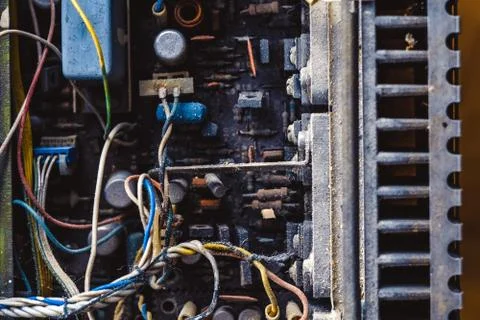 Microchips in old circuit board printed circuit board. Stock Photos