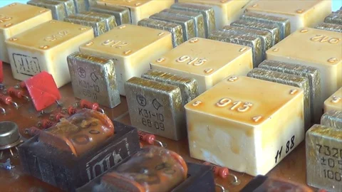 Microchips of the radio components mounted on the board close-up Stock Footage 115500222